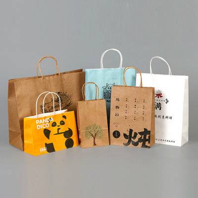 Compostable kraft retail paper bags with twisted handles