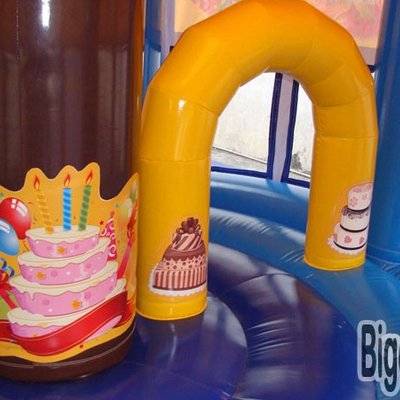 Inflatable birthday cake moon bouncer